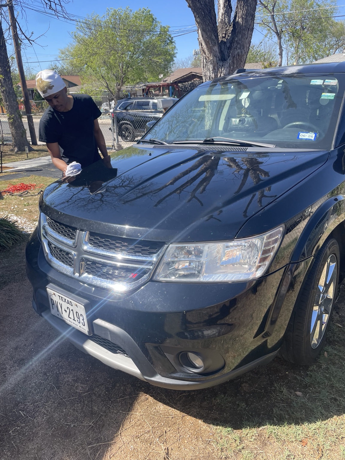 Black SUV after exterior detailing by Curbside Shine