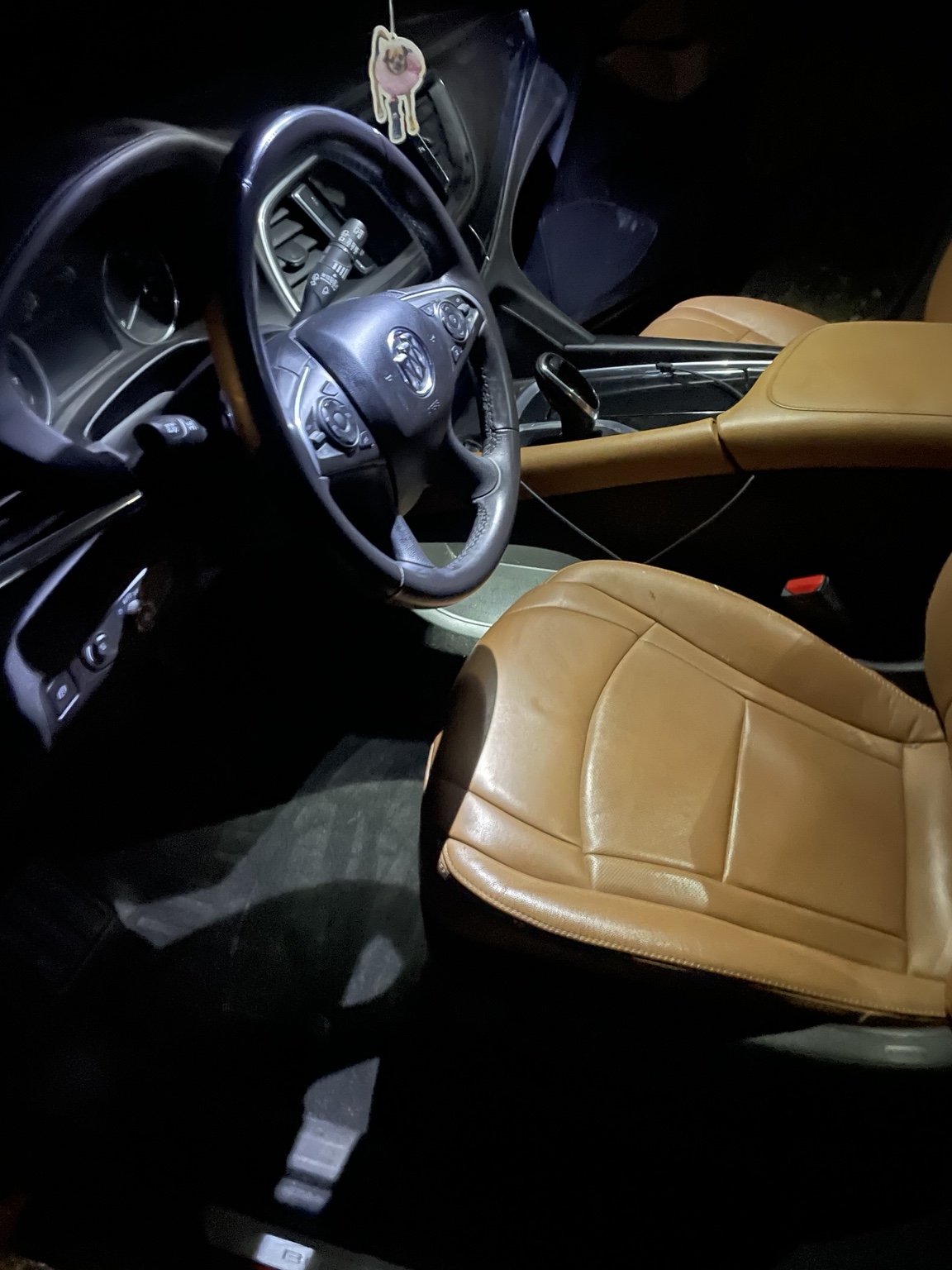 Red Buick SUV detailed at customer location in the evening